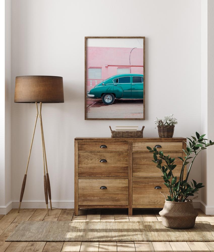 Bildverkstad Blue Car At Pink Wall Poster